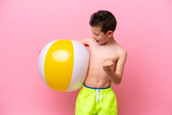 Little Caucasian Boy Holding Beach Ball Isolated Pink Background Celebrating — Zdjęcie stockowe