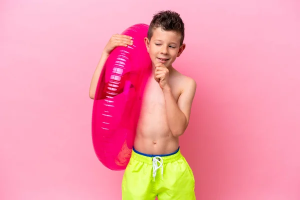 Little Caucasian Boy Holding Inflatable Donut Isolated Pink Background Looking — Photo