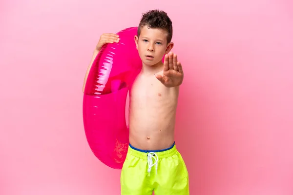 Little Caucasian Boy Holding Inflatable Donut Isolated Pink Background Making —  Fotos de Stock