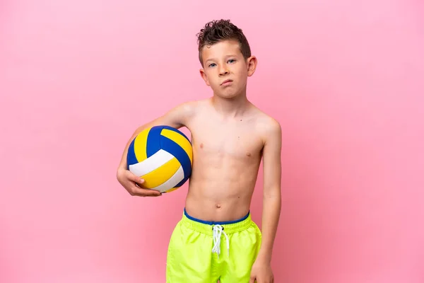 Little Caucasian Boy Playing Volleyball Isolated Pink Background Sad Expression — 스톡 사진
