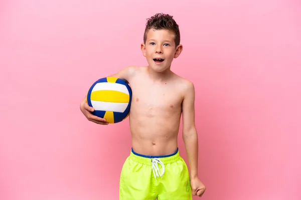 Little Caucasian Boy Playing Volleyball Isolated Pink Background Surprise Shocked —  Fotos de Stock