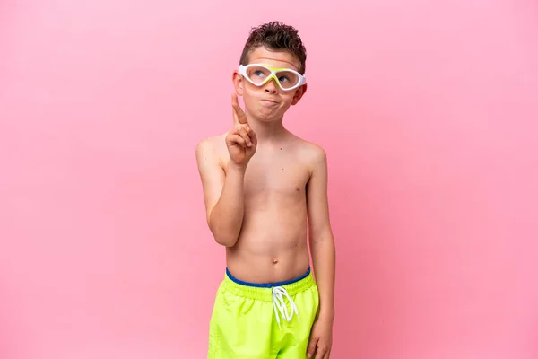 Little Caucasian Boy Wearing Diving Goggles Isolated Pink Background Fingers — Photo