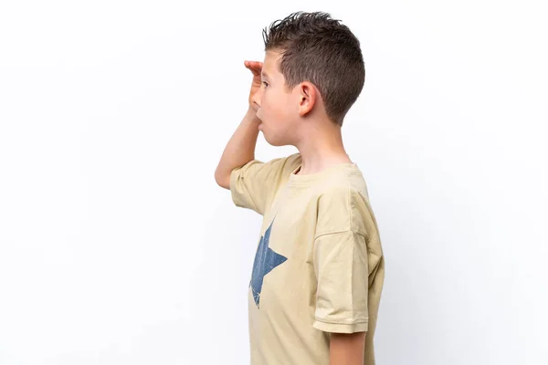 Little Caucasian Boy Isolated White Background Surprise Expression While Looking — Stock fotografie