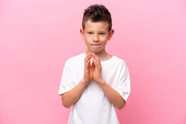 Little Caucasian Boy Isolated Pink Background Scheming Something — Stock Photo, Image