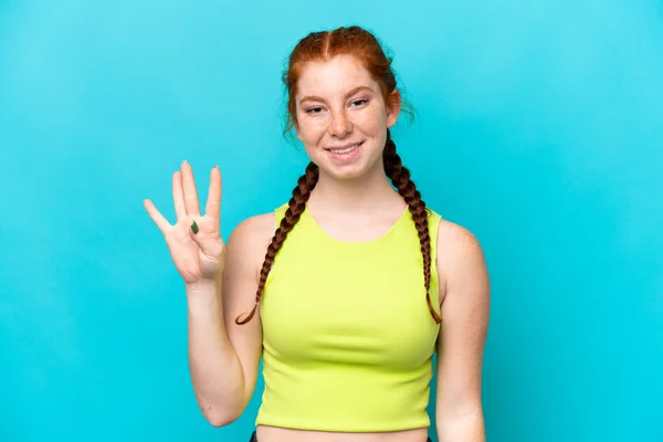 Young Reddish Woman Isolated Blue Background Happy Counting Four Fingers — Foto de Stock