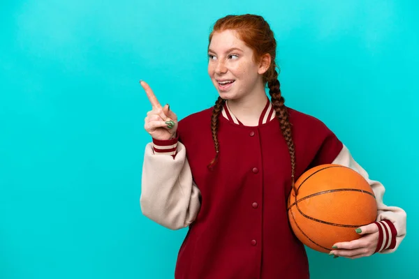 Young Reddish Woman Playing Basketball Isolated Blue Background Intending Realizes — 图库照片