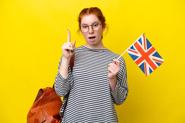 Young Hispanic Woman Holding United Kingdom Flag Isolated Yellow Background — Stock fotografie