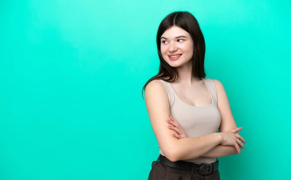 Young Russian Woman Isolated Green Background Looking Side Smiling — Foto de Stock