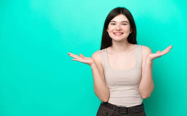 Young Russian Woman Isolated Green Background Shocked Facial Expression — Stockfoto