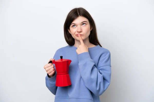 Young Russian Woman Holding Coffee Pot Isolated White Background Having — стоковое фото