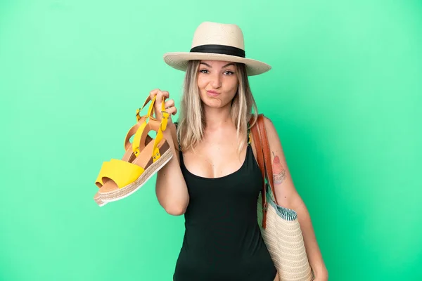 Young Romanian Woman Swimsuit Holding Sandals Beach Isolated Green Background — Fotografia de Stock