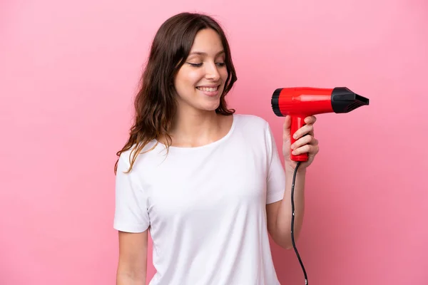 Young Caucasian Woman Holding Hairdryer Isolated Pink Background Happy Expression — ストック写真