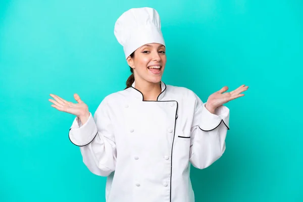 Young Caucasian Chef Woman Isolated Blue Background Shocked Facial Expression — Stockfoto