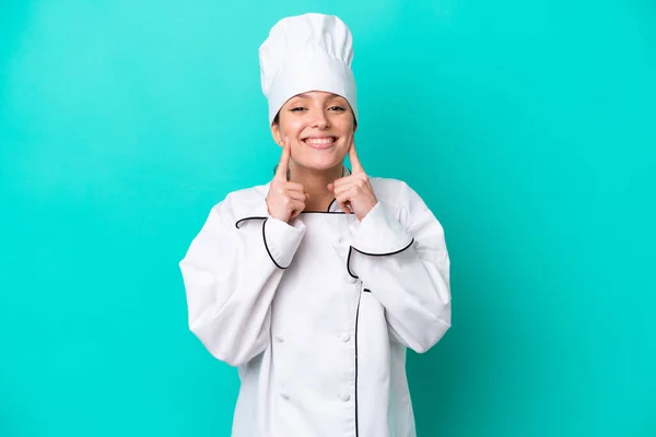 Young Caucasian Chef Woman Isolated Blue Background Smiling Happy Pleasant —  Fotos de Stock