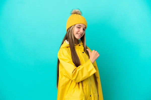 Little Girl Wearing Rainproof Coat Isolated Blue Background Proud Self — 스톡 사진