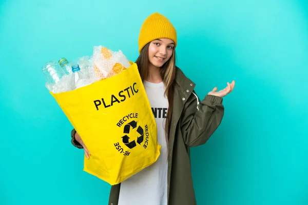 Little Girl Holding Bag Full Plastic Bottles Recycle Isolated Blue — Stock Photo, Image