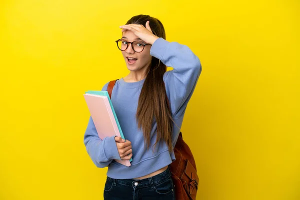 Student Kid Woman Isolated Yellow Background Doing Surprise Gesture While — Φωτογραφία Αρχείου