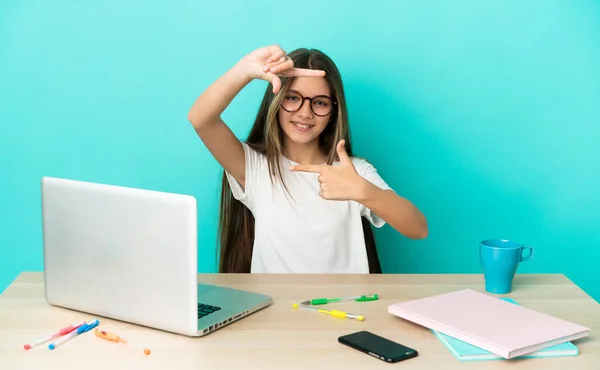 Little Girl Table Laptop Isolated Blue Background Focusing Face Framing — Fotografia de Stock