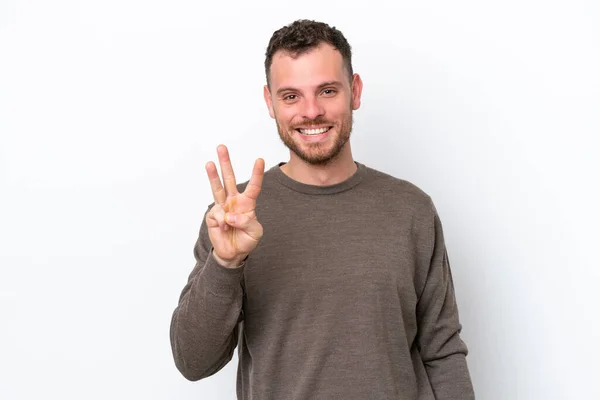 Молодой Бразилец Белом Фоне Счастлив Считает Троих Пальцами — стоковое фото