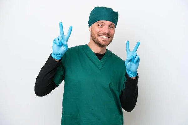 Surgeon Brazilian Man Green Uniform Isolated White Background Showing Victory — Stockfoto