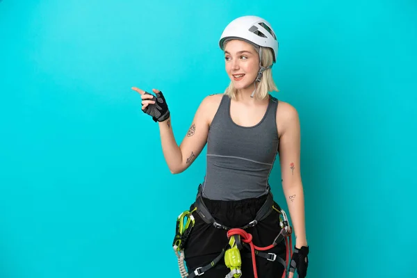 Young Caucasian Rock Climber Woman Isolated White Background Pointing Finger —  Fotos de Stock