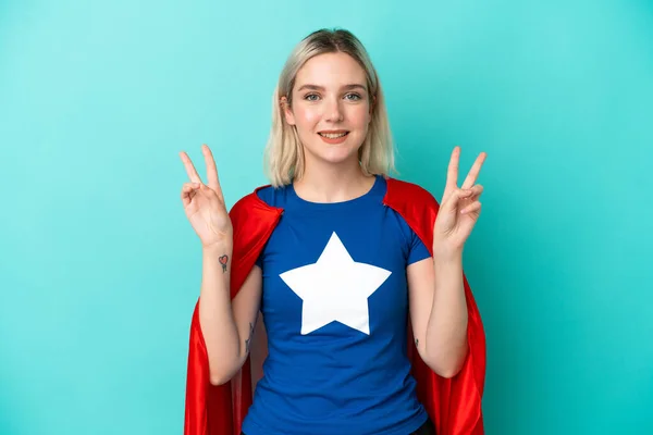 Super Hero Caucasian Woman Isolated Blue Background Showing Victory Sign — Foto Stock