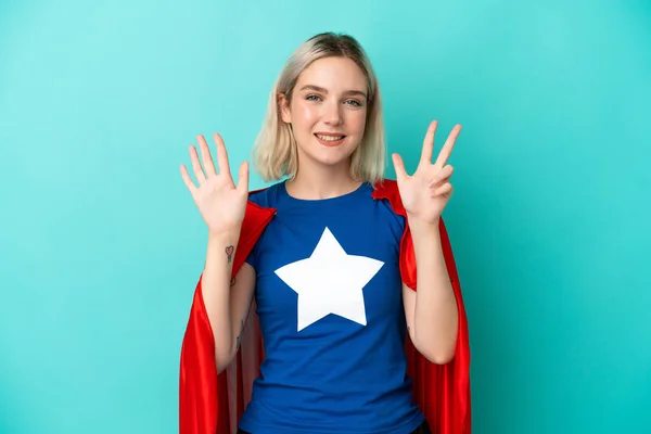 Süper Kahraman Beyaz Kadın Mavi Arka Planda Izole Edilmiş Parmaklarıyla — Stok fotoğraf