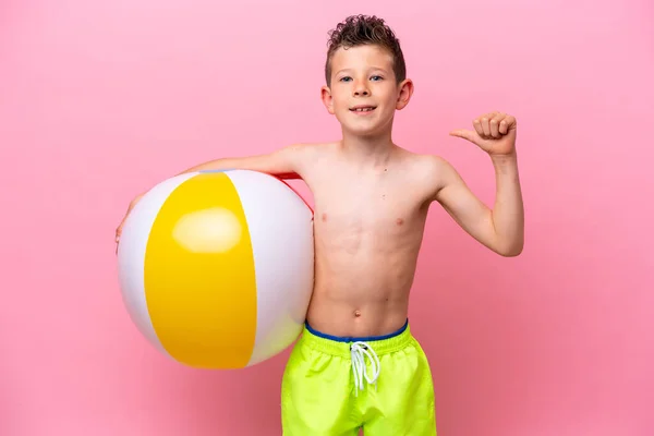 Little Caucasian Boy Holding Beach Ball Isolated Pink Background Proud —  Fotos de Stock