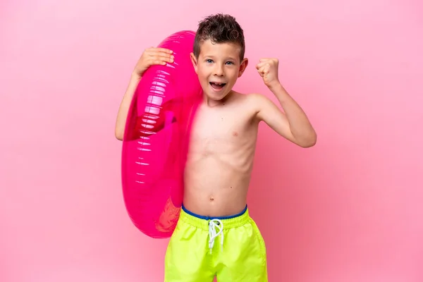 Little Caucasian Boy Holding Inflatable Donut Isolated Pink Background Celebrating —  Fotos de Stock