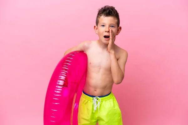 Little Caucasian Boy Holding Inflatable Donut Isolated Pink Background Surprise —  Fotos de Stock