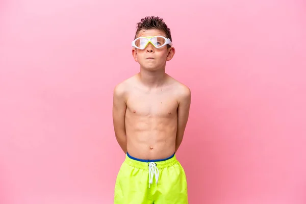 Little Caucasian Boy Wearing Diving Goggles Isolated Pink Background Looking — 스톡 사진