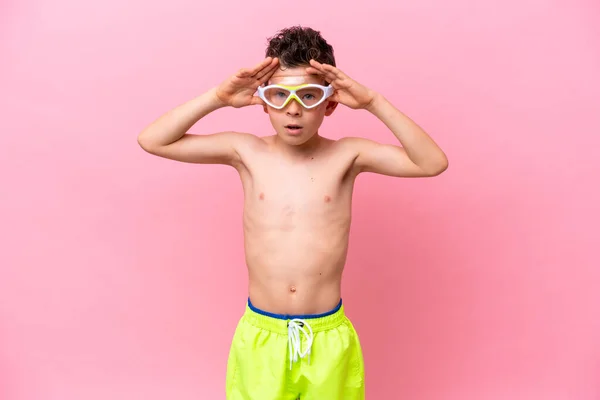 Little Caucasian Boy Wearing Diving Goggles Isolated Pink Background Surprise — 图库照片