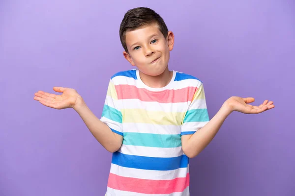 Little Boy Isolated Purple Background Having Doubts While Raising Hands — 图库照片