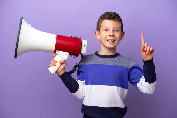 Little Boy Isolated Purple Background Holding Megaphone Pointing Great Idea — Stockfoto