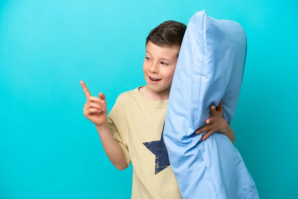 Little Boy Pajamas Isolated Blue Background Intending Realizes Solution While — Zdjęcie stockowe