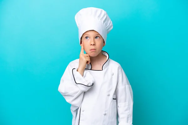 Little Chef Boy Isolated Blue Background Thinking Idea — Foto Stock