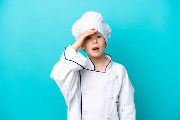 Little Chef Boy Isolated Blue Background Doing Surprise Gesture While — Foto Stock