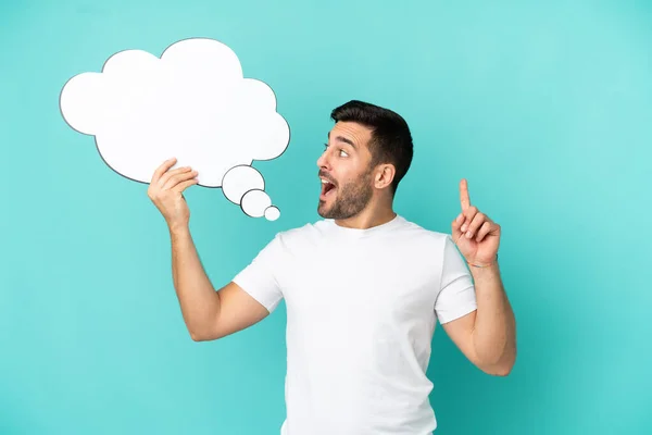 Young Handsome Caucasian Man Isolated Blue Background Holding Thinking Speech — Stock fotografie