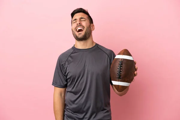 Young Caucasian Man Playing Rugby Isolated Pink Background Laughing — Stock Photo, Image