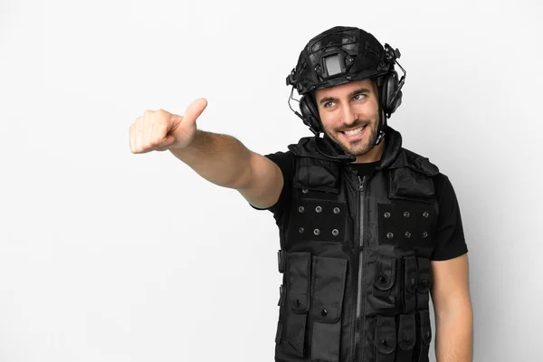 Young Caucasian Swat Isolated White Background Giving Thumbs Gesture — Stockfoto