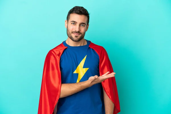 Super Hero Caucasian Man Isolated Blue Background Presenting Idea While — Foto de Stock