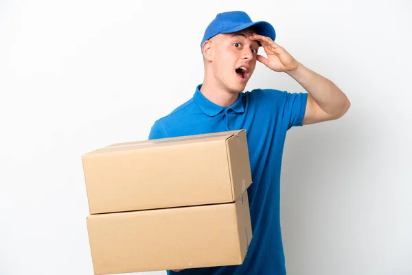 Young Delivery Brazilian Man Isolated Ops White Background Doing Surprise — Stock Photo, Image