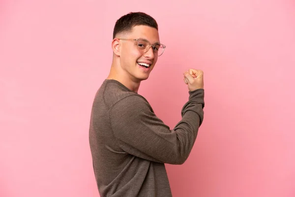 Young Brazilian Man Isolated Pink Background Doing Strong Gesture — Stock Photo, Image