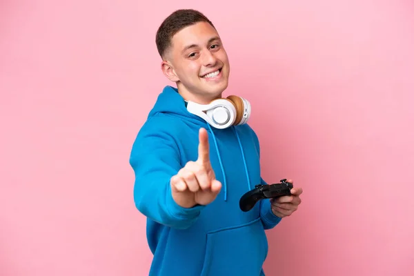 Young Brazilian Man Playing Video Game Controller Isolated Pink Background — Foto Stock