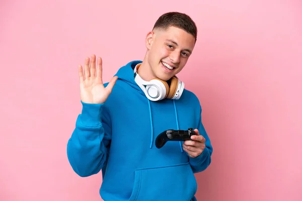 Young Brazilian Man Playing Video Game Controller Isolated Pink Background —  Fotos de Stock