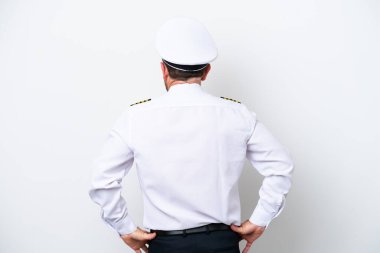 Airplane middle age pilot isolated on white background in back position