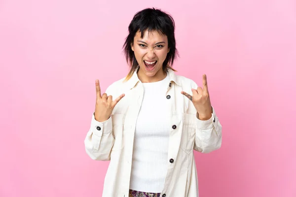 Young Uruguayan Woman Isolated Pink Background Making Horn Gesture — Foto Stock
