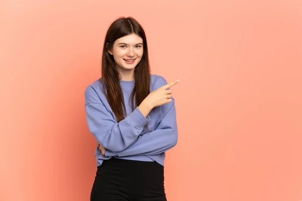 Young Ukrainian Girl Isolated Pink Background Pointing Finger Side — ストック写真