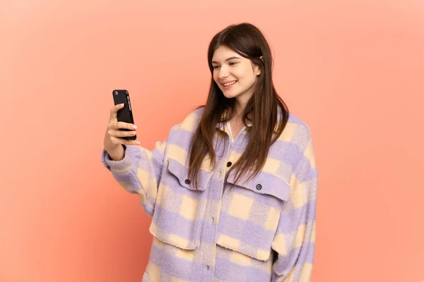 Young Ukrainian Girl Isolated Pink Background Making Selfie —  Fotos de Stock