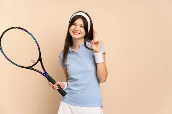 Young Ukrainian Girl Tennis Player Isolated Wall Fingers Crossing Wishing — 스톡 사진